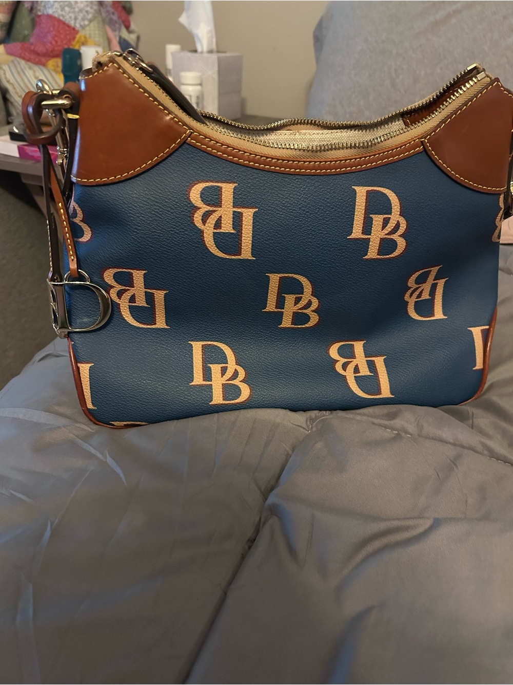 Dooney & Bourke Blue Shoulder Bag with Tan Trim and Logo Print